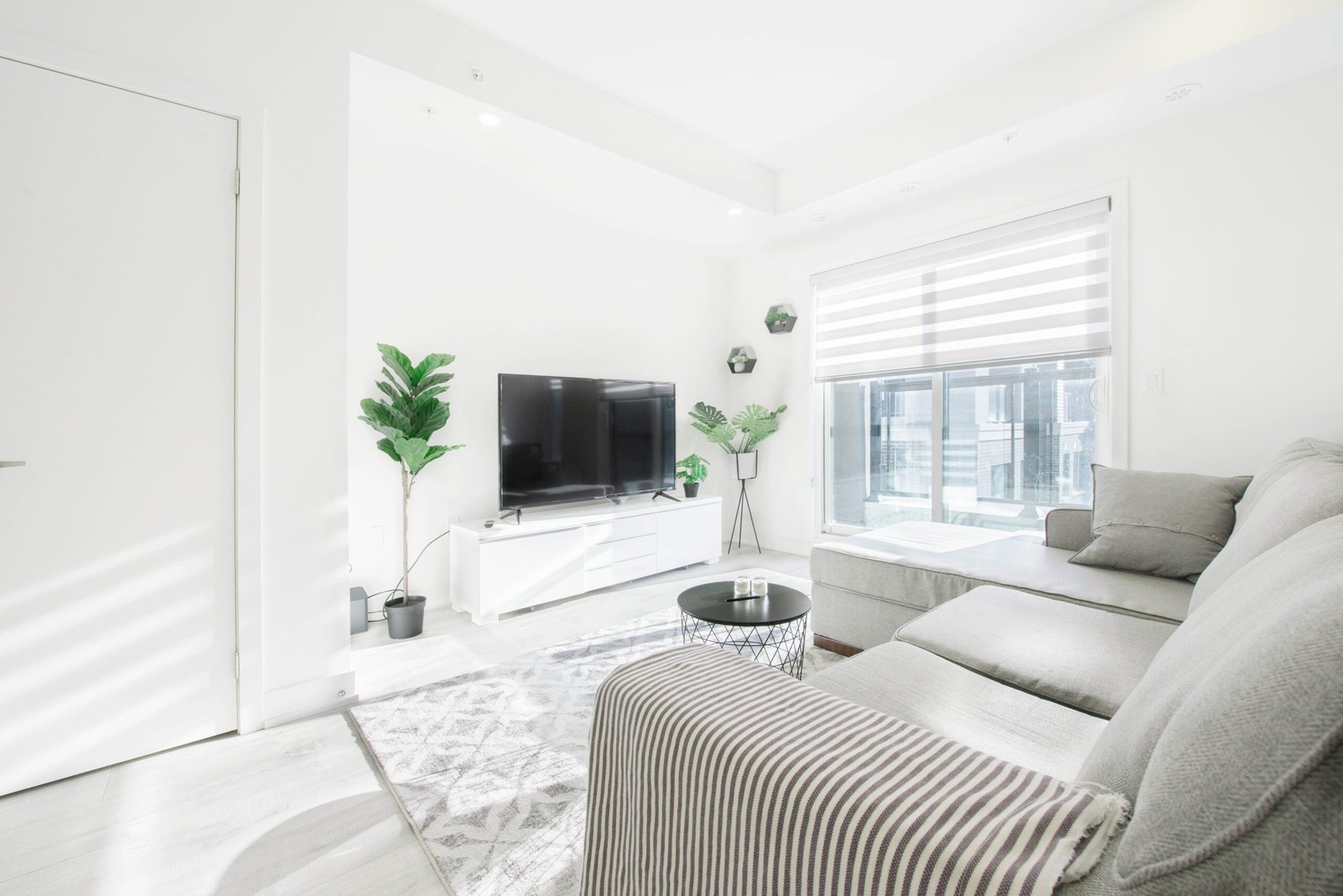 Home Bright and airy living room with modern minimalist decor and natural light.